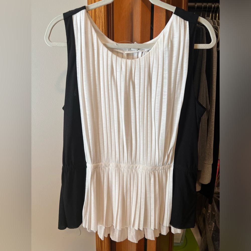 JCrew black and white top with elastic waist in size L.